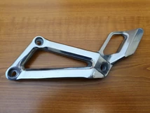 Aprilia Pegaso 650 Bal Első Lábtartó Konzol - Új