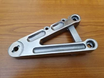 Aprilia RS 250 Jobb Első Lábtartó Konzol - Új